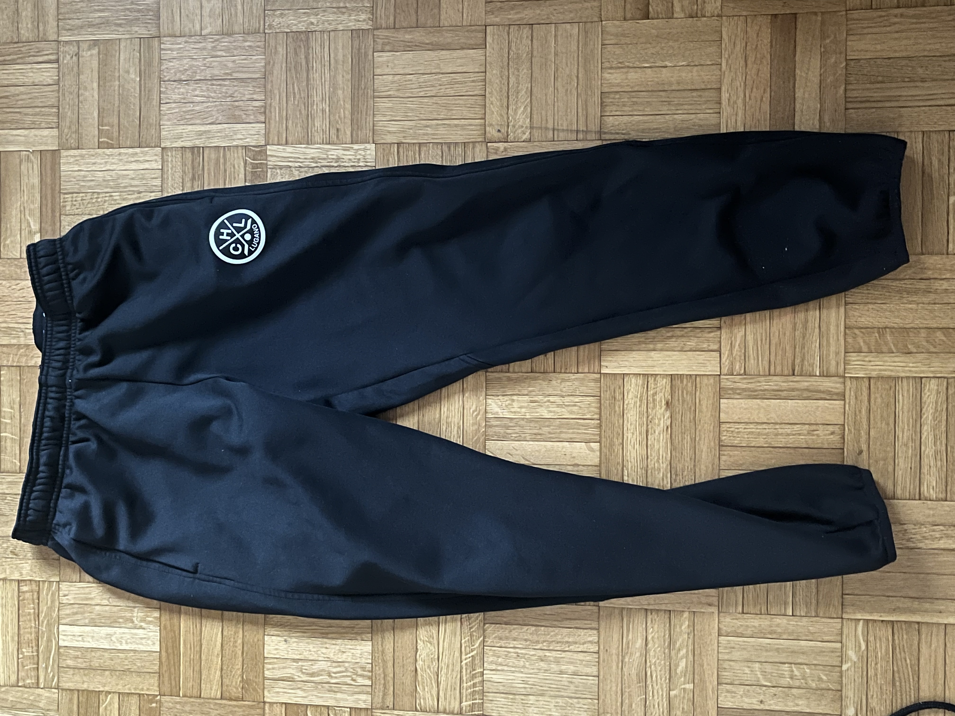 Pantaloni e maglietta HCL